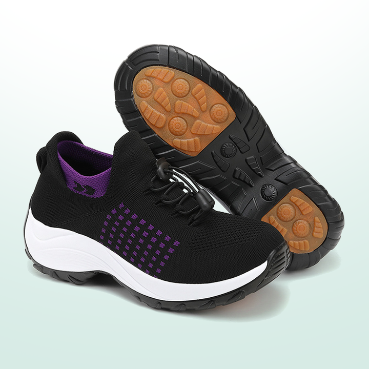 Sorte sneakers med lilla geometriske detaljer, hvid mellemsål og snørelukning