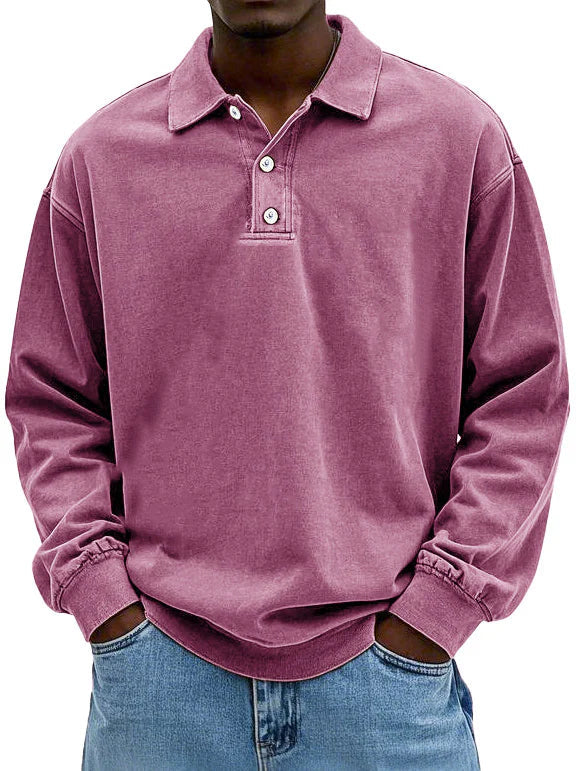 Herre i ensfarvet langærmet poloshirt med krave og knapstolpe