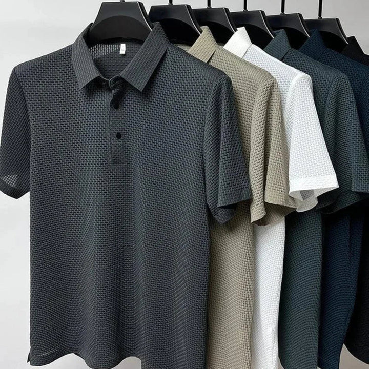 Herrepoloshirt med krave, korte ærmer og sort vaffelstruktur