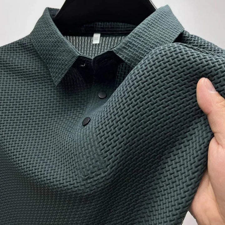 Herrepoloshirt med krave, korte ærmer og sort vaffelstruktur