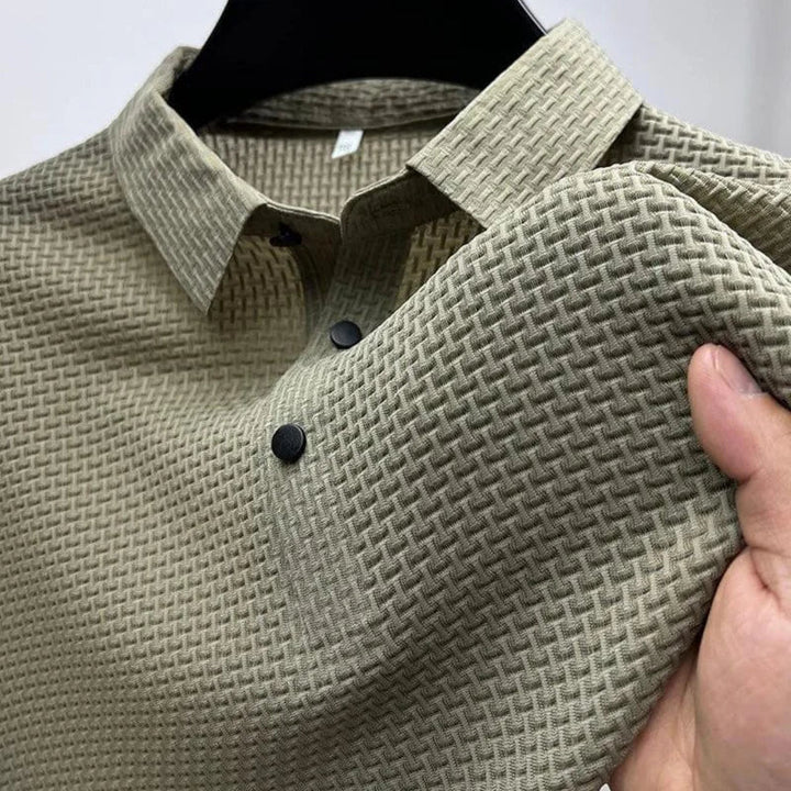 Herrepoloshirt med krave, korte ærmer og sort vaffelstruktur