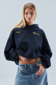 Dame oversize hættetrøje med hætte, lange ærmer, kængurulomme og kort længde