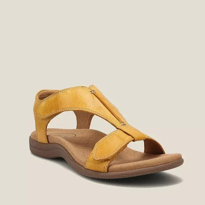 Dame sandal med T-rem, justerbare velcroremme og formet fodseng