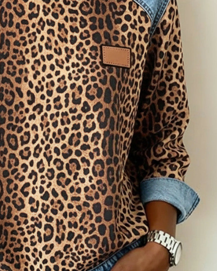 Damesweatshirt med leopardmønster og blå kontrastdetaljer