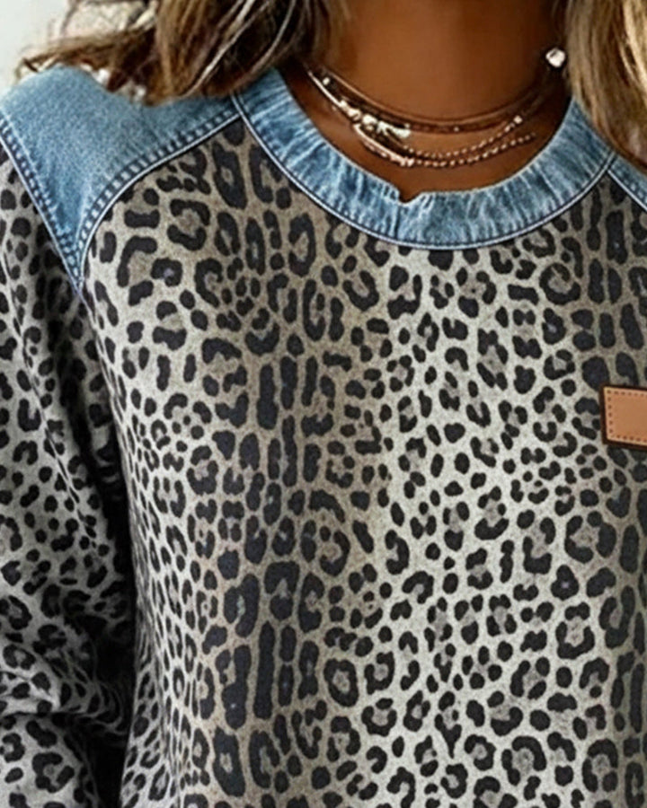 Damesweatshirt med leopardmønster og blå kontrastdetaljer