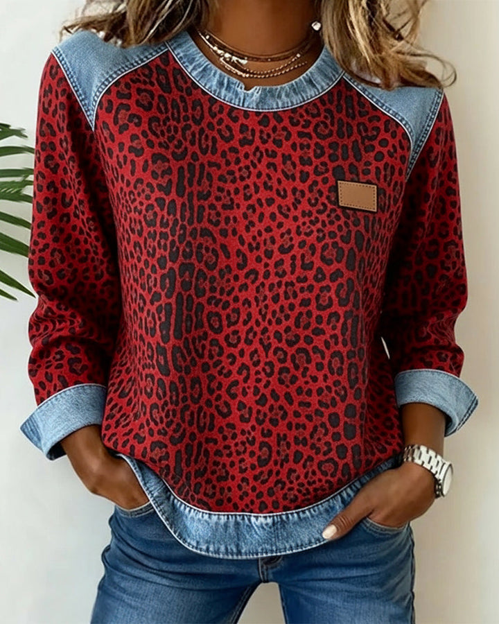 Damesweatshirt med leopardmønster og blå kontrastdetaljer
